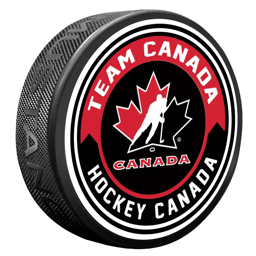Hockey Canada IIHF Arrow Textured Hockey Puck product image 1, provided for visual reference and product detail review